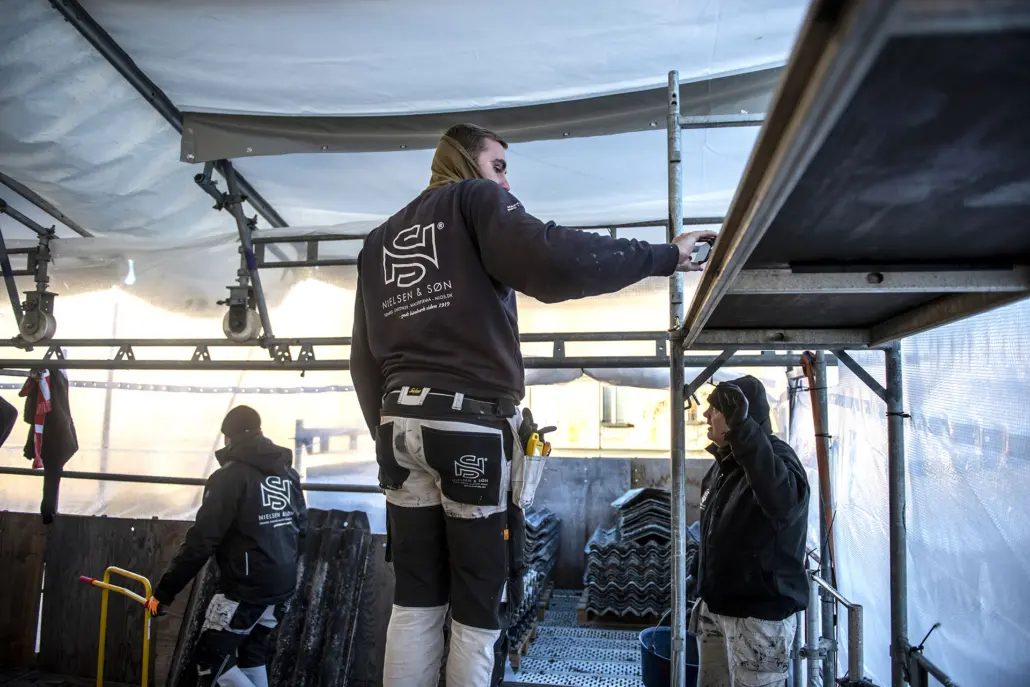 Tømrere Erfarne tømrere i gang med at arbejde
